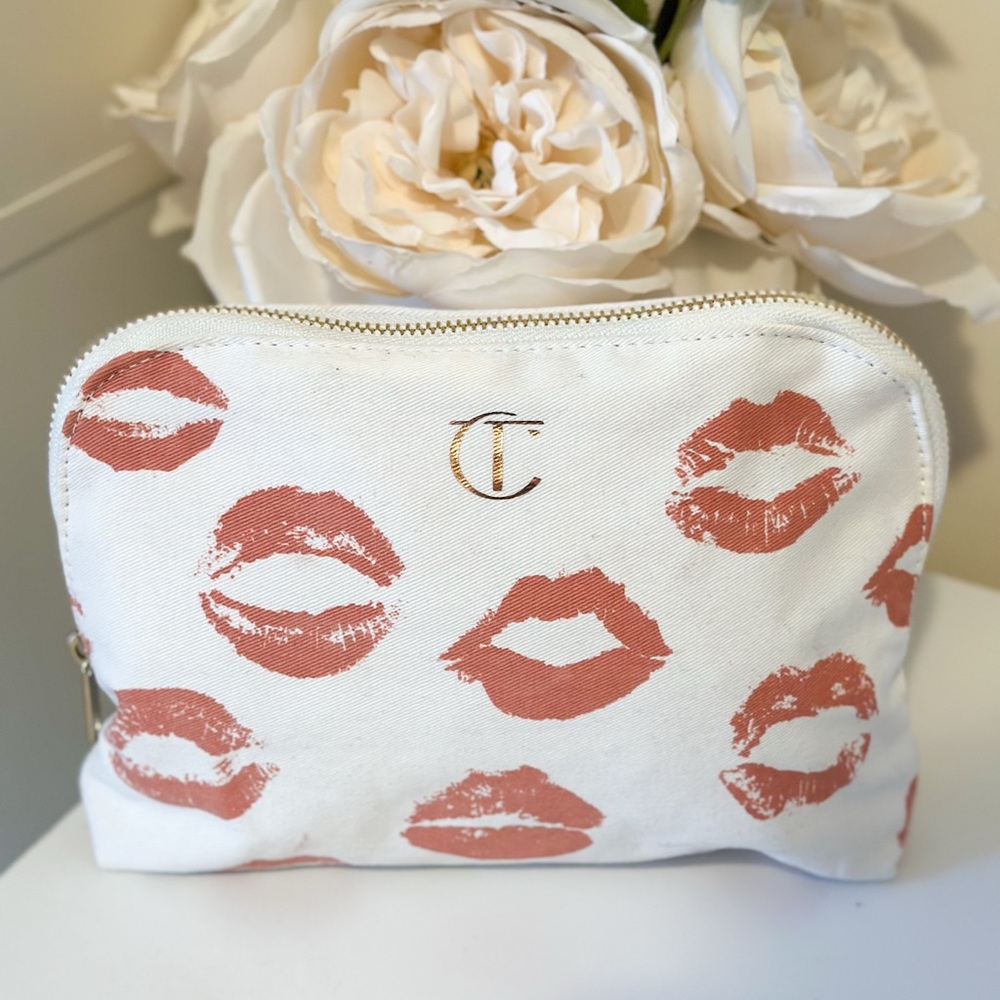 Charlotte Tilbury Cream Cosmetic Pouch with Pink Lip Print and Gold Logo